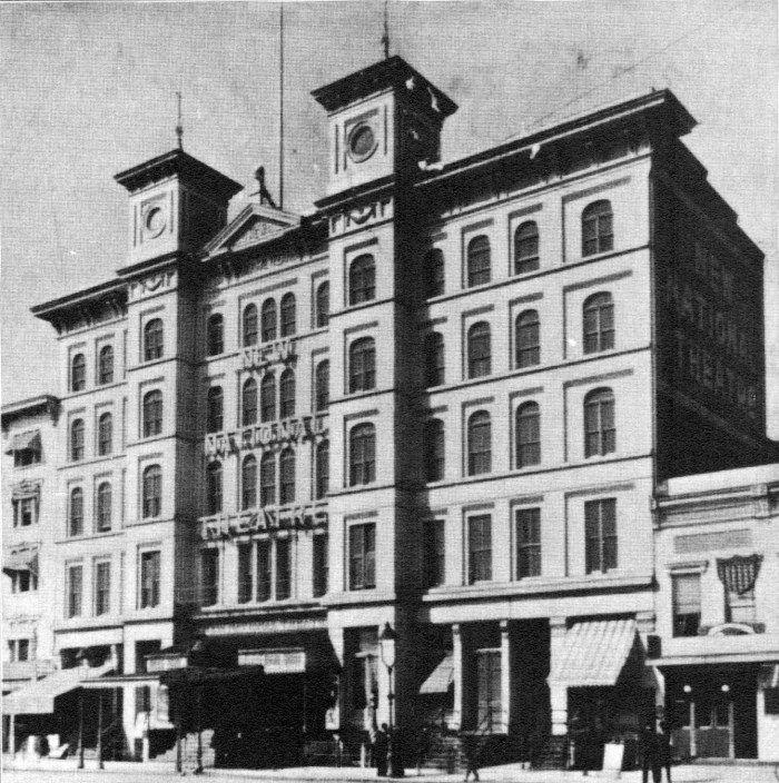A black and white photograph of the New National Theatre.
