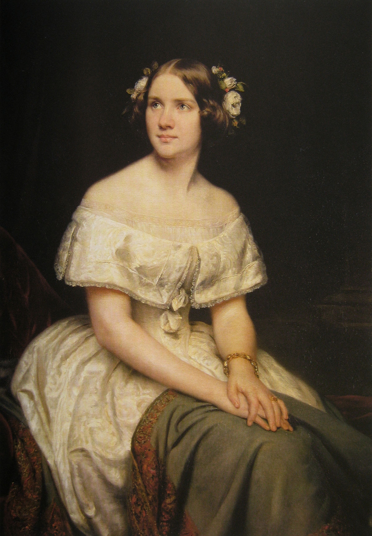 A painted portrait of Jenny Lind, seated with hands folded on her lap.